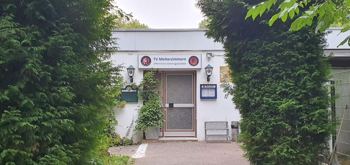 Eingang der öffentlichen Vereinsgaststätte des TV Metterzimmern
